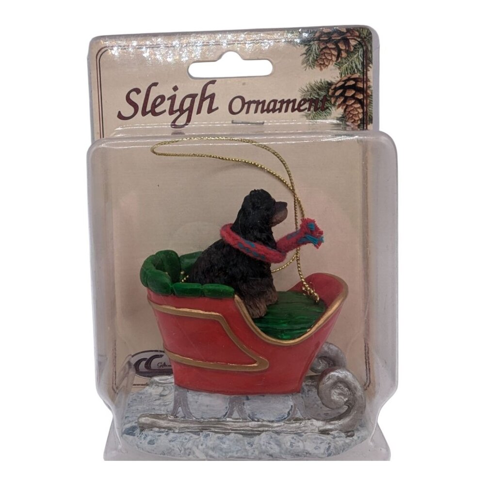 Conversation Concepts Black & Brown Cocker Spaniel Sleigh Christmas Ornament